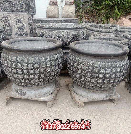 自然美學(xué)結(jié)合青石石雕、浮雕、編織、雕塑的戶外園林魚缸